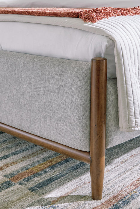 Lyncott California King Upholstered Bed with Mirrored Dresser