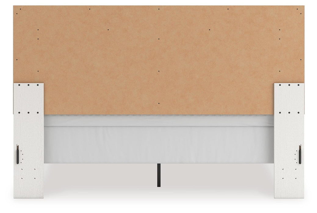 Zuraleus King Upholstered Panel Bed, Dresser, Mirror, Chest and Nightstand